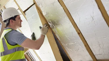 a man installing attic installation