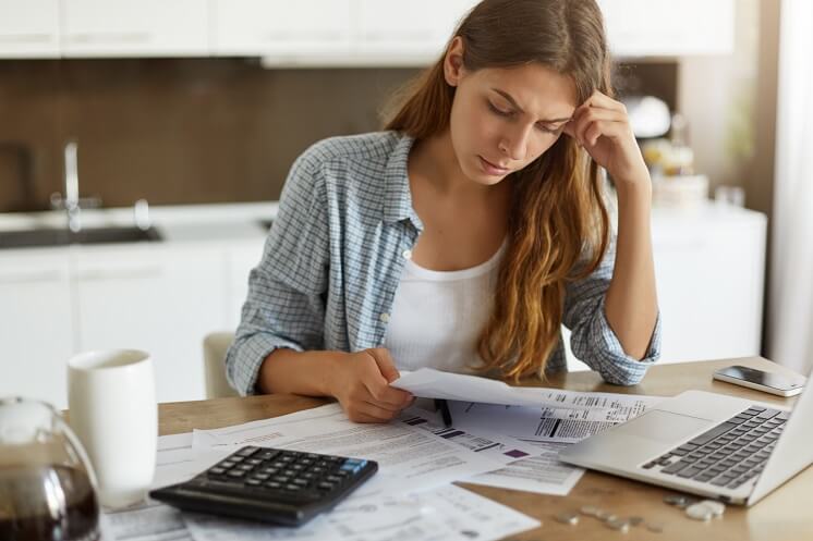 Lady working out energy bills