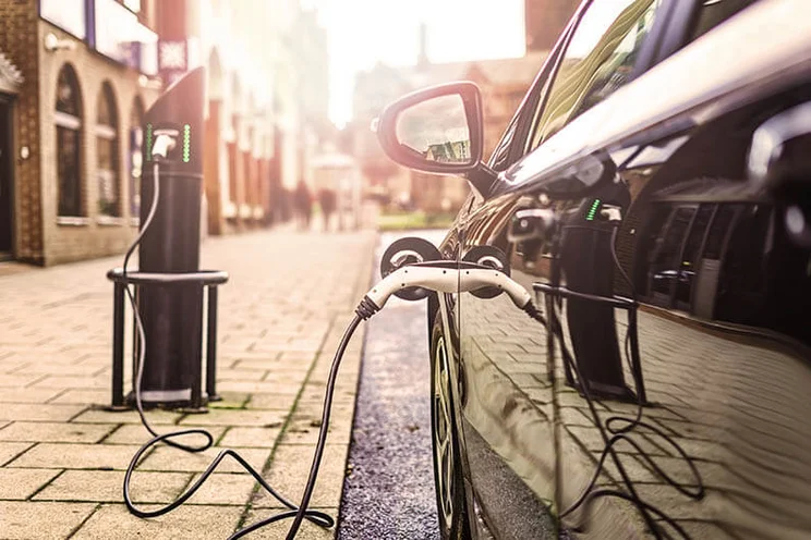 EV charger connected to car in London