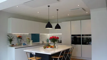 Ceiling-mounted infrared heating panels by Herschel