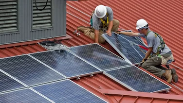 Solar panels being installed.