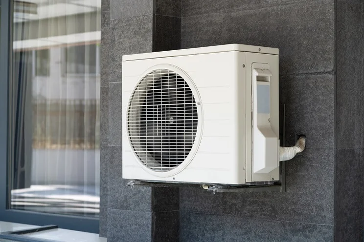 Heat pump on a wall