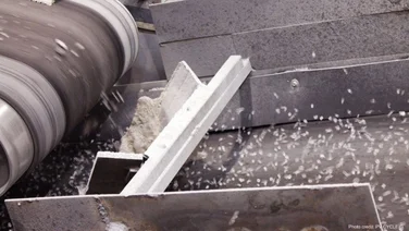 Glass granulate being extracted from a solar panel during the recycling process