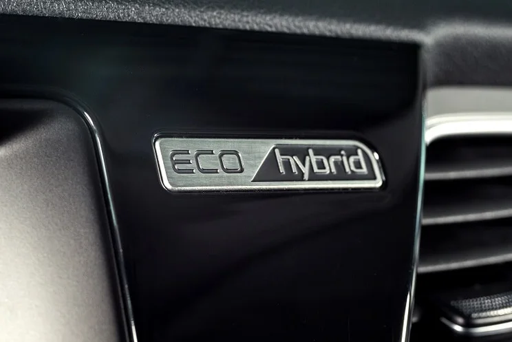 Close-up of eco hybrid label inside car