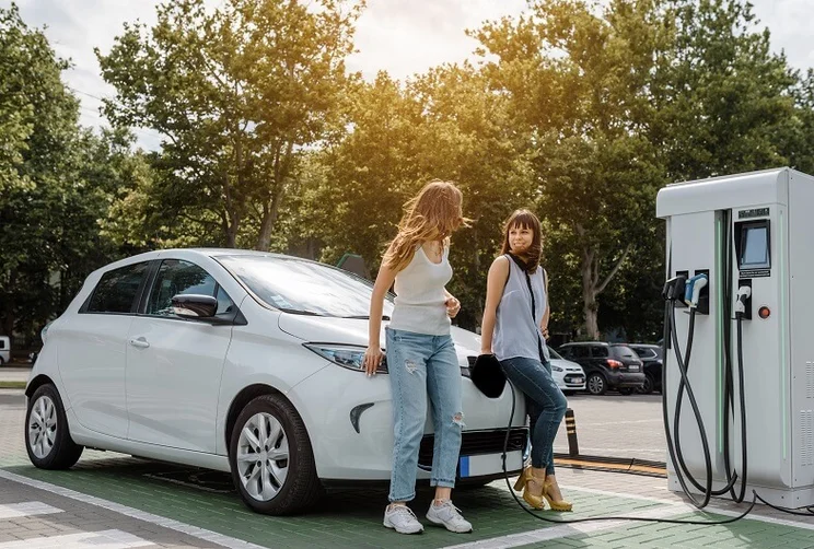 Electric car charging in the sunshine