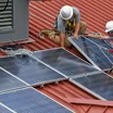 Solar panels being installed.