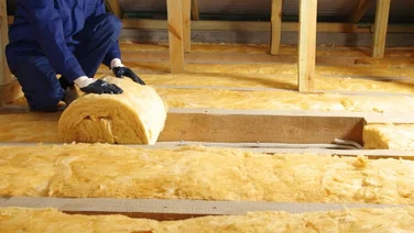 insulation being installed in a loft