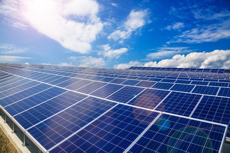 solar panels under a blue sky