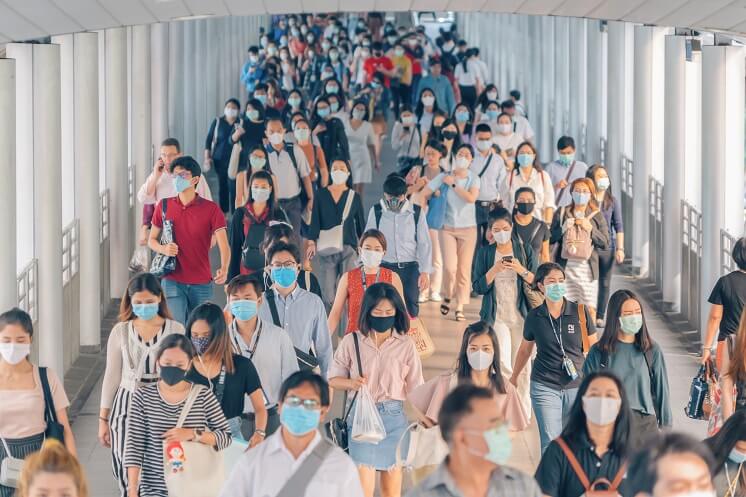 Crowd of people with face masks on