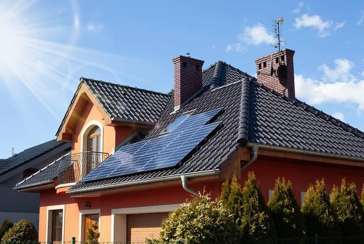 Solar panels in the sun on a roof