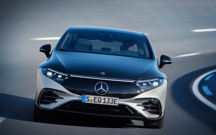 A Mercedes EQS 450+ on a road