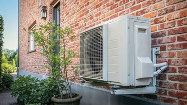 Air-to-air heat pump outside a building