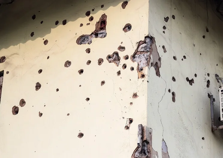 Bullet-ridden building in the Donbas region, Ukraine