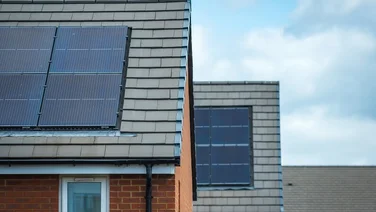 Solar panels on the roof of two new build homes in the UK