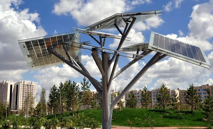 Solar tree with solar panels on each branch angled at different directions facing the sky