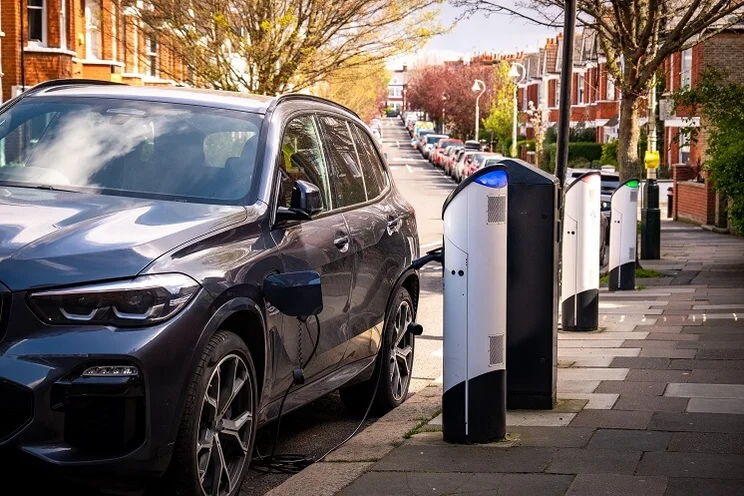 Car using on-street EV charging