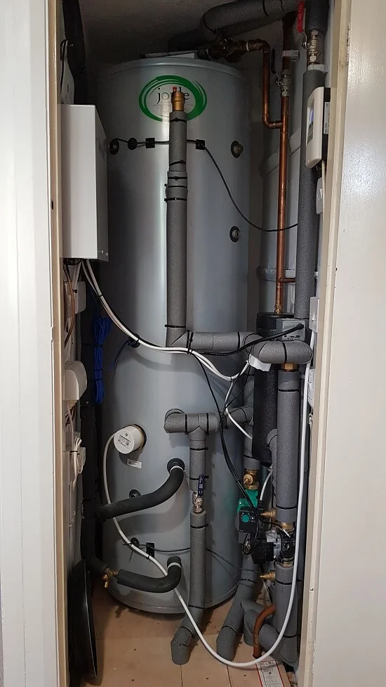 Water tank paired with a heat pump