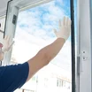 Workman installing a window.