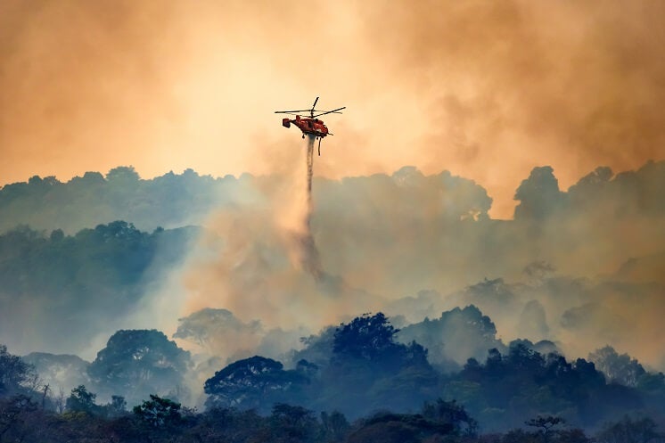 Helicopter putting fire out