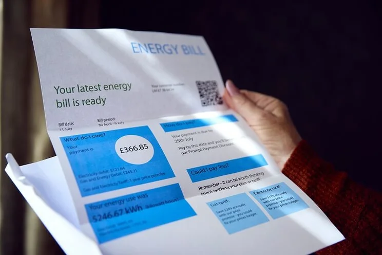 Someone reading an energy bill