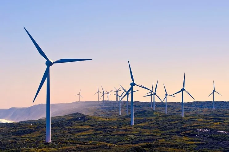 Wind turbines in the sunrise