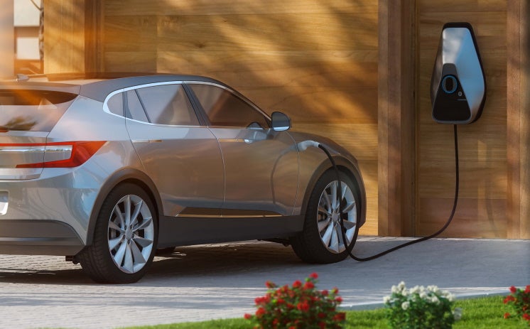 an electric vehicle being charged