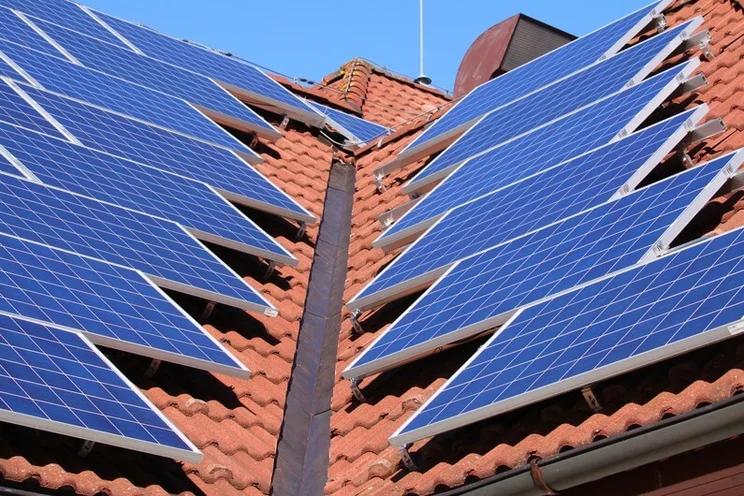 Solar panels on a red roof