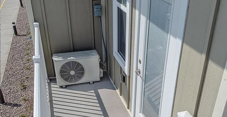 Heat pump on a balcony.