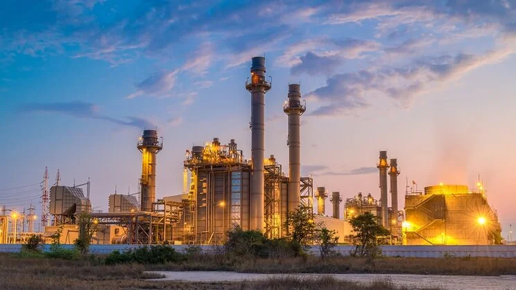 Natural gas facility at sunset