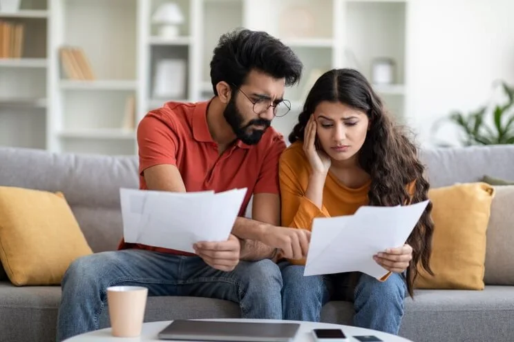 couple look at papers