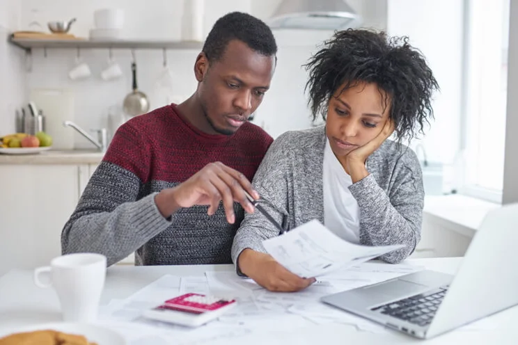 couple with energy bills