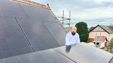A solar panel installer