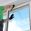 Engineer repairing double glazed window
