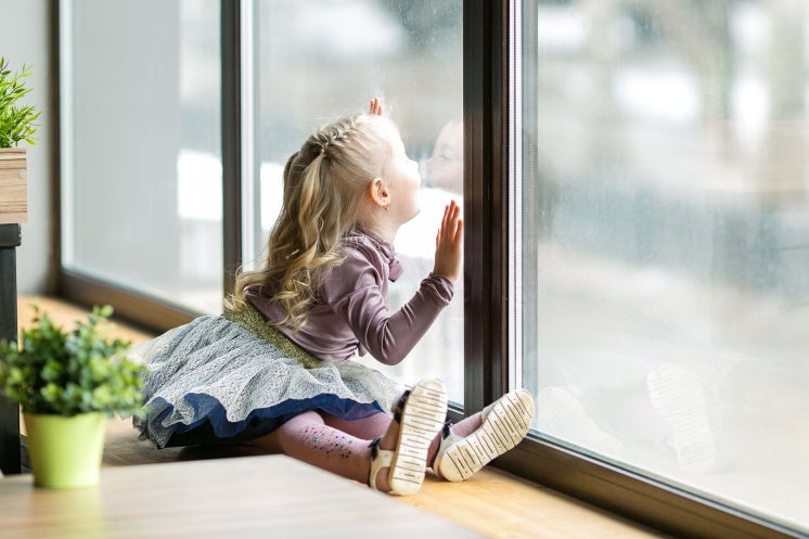 girl by a window