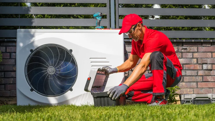 Heat pump engineer at work