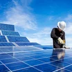 Workman installing solar panels.