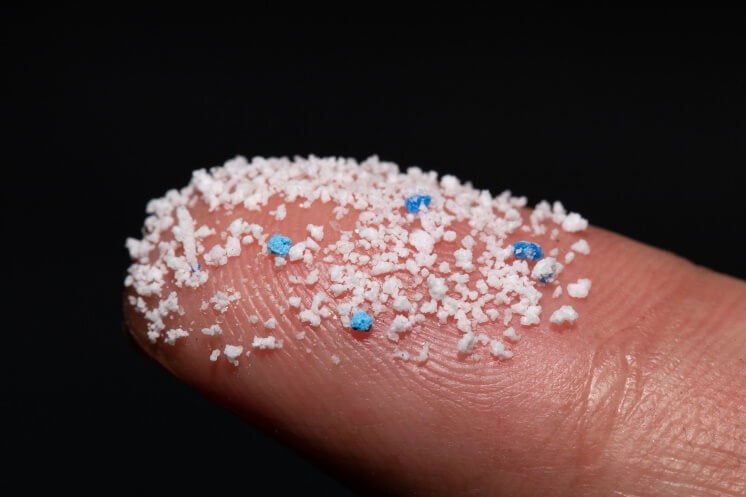 microplastics on a fingertip