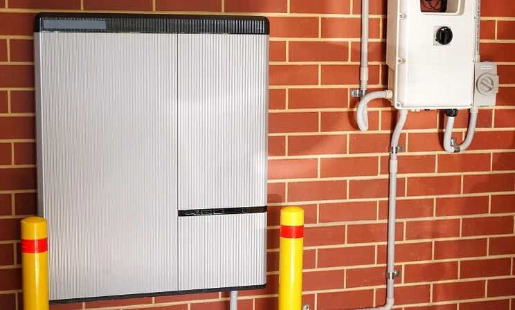 solar storage battery attached to brick wall