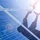 close up of man's hands installing solar panels