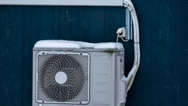 heat pump on the outside of a house