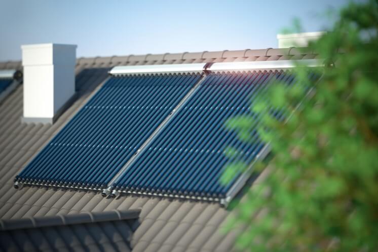 two solar thermal panels on the roof of a house