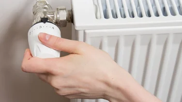 Someone turning temperature up on radiator