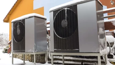 heat pumps by a house