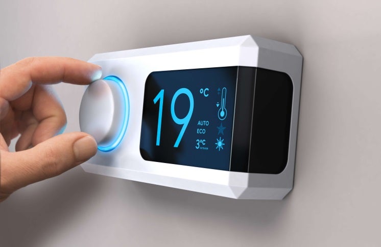 a person turns up their thermometer