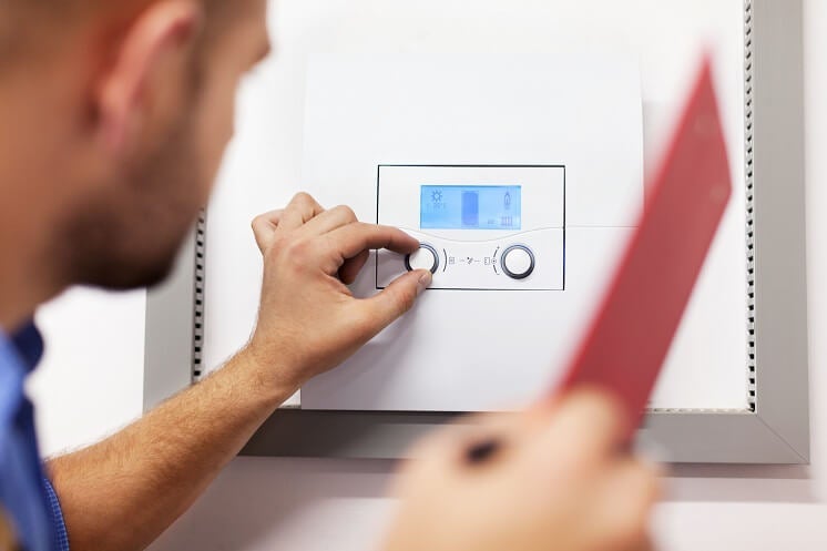Man fixing boiler