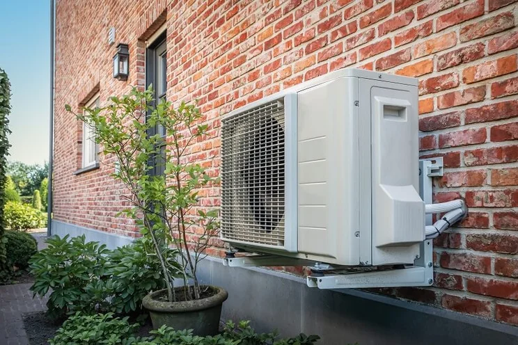 Air-to-air heat pump outside a building