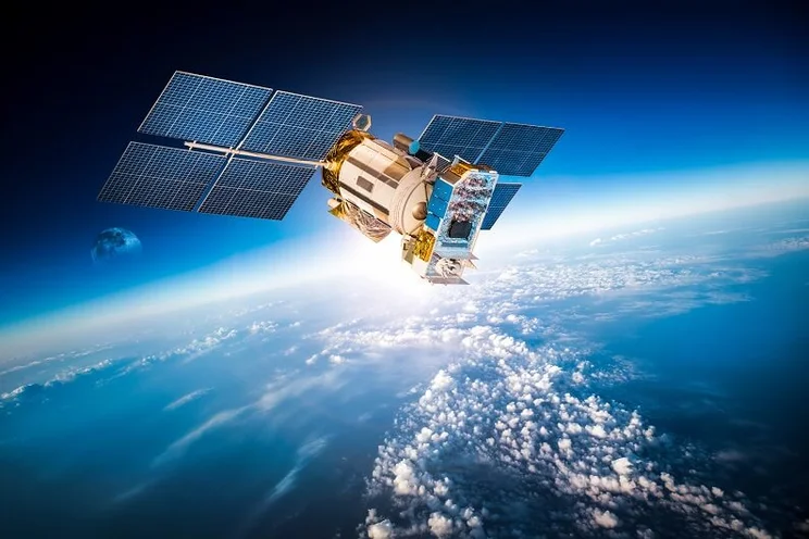 Satellite in space with solar panels