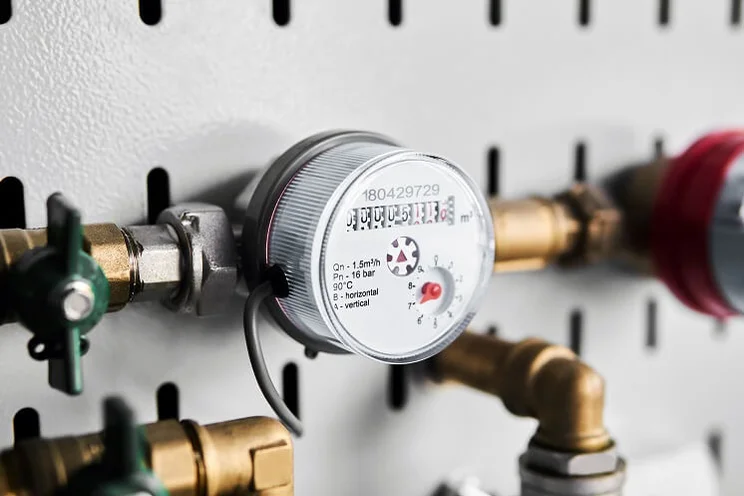 close up of a water meter installed on a pipeline