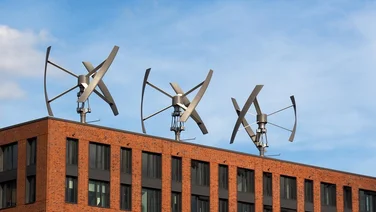 Roof-mounted wind turbines on a building