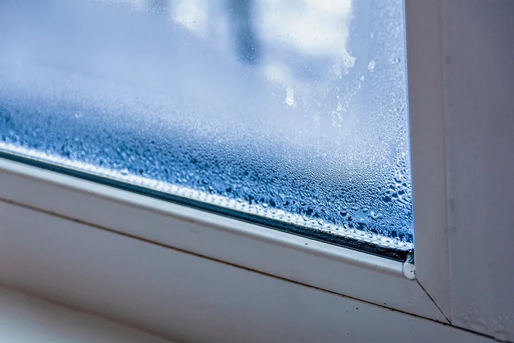 Condensation in between window panes in a double-glazed window